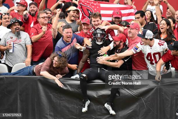 Marquise Brown of the Arizona Cardinals celebrates after catching a touchdown pass against the Cincinnati Bengals during the second quarter at State...