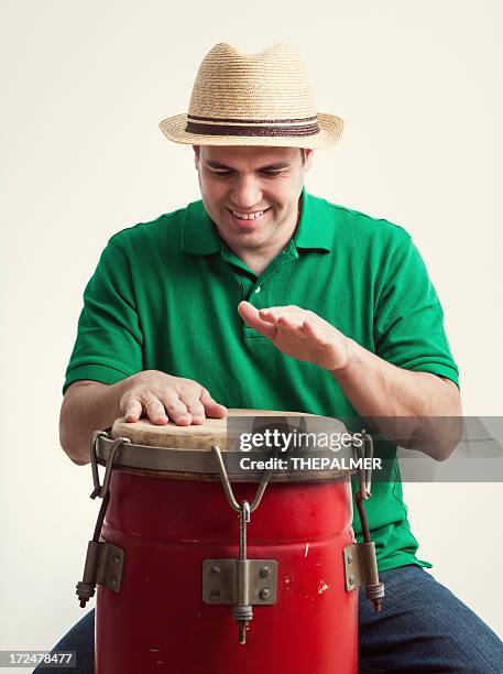 young man playing congas - rumba stock pictures, royalty-free photos & images