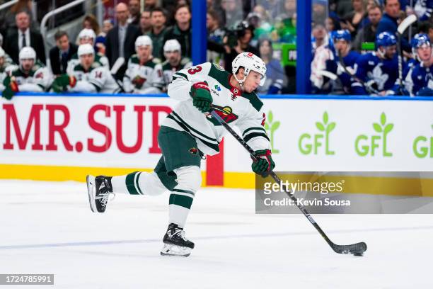 Marco Rossi of the Minnesota Wild shoots the puck against the Toronto Maple Leafs during the first period at the Scotiabank Arena on October 14, 2023...