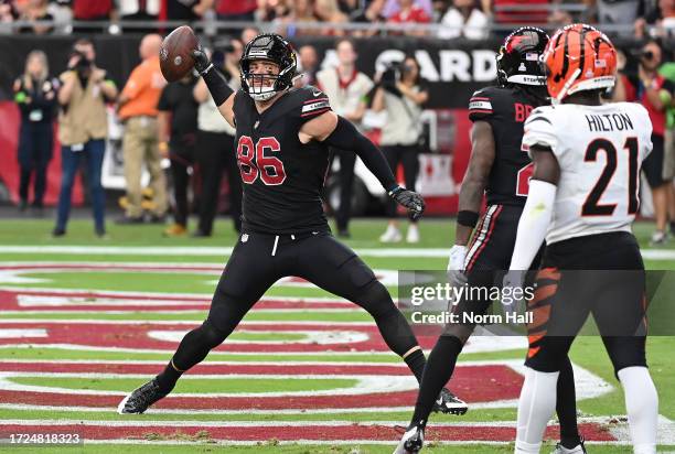 Zach Ertz of the Arizona Cardinals celebrates catching a touchdown pass against the Cincinnati Bengals during the second quarter at State Farm...