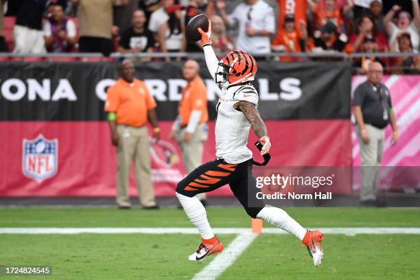 Ja'Marr Chase of the Cincinnati Bengals celebrates catching a touchdown pass against the Arizona Cardinals during the third quarter at State Farm...