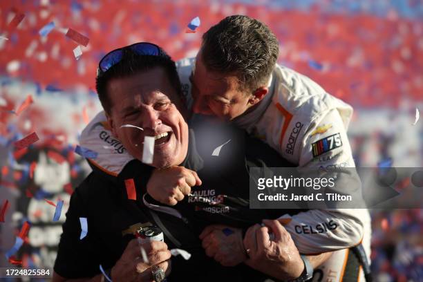 Allmendinger, driver of the Celsius Chevrolet, and Matt Kaulig, owner of Kaulig Racing celebrate in victory lane after winning the NASCAR Cup Series...