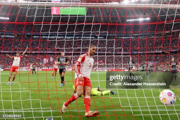 Leroy Sane of FC Bayern München celebrates after scoring the 2nd team goal against Noah Atubolu, keeper of Freiburg during the Bundesliga match...