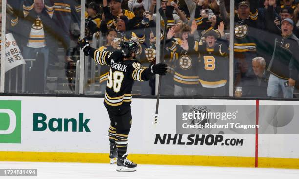 David Pastrnak of the Boston Bruins scores on a penalty shot against the Nashville Predators during the second period to take the lead in the game at...