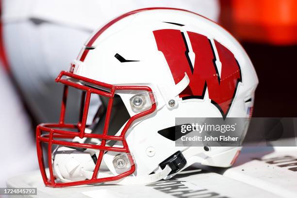 Picture of the Wisconsin Badgers helmet worn during the game against the Rutgers Scarlet Knights at Camp Randall Stadium on October 07, 2023 in...