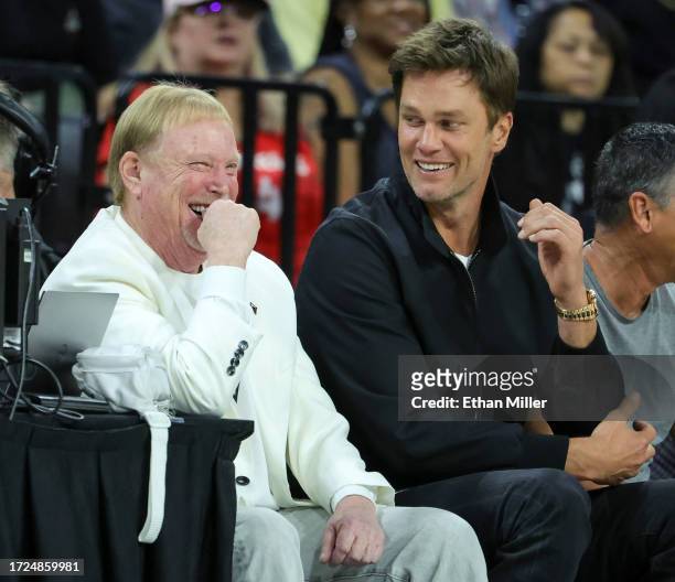 Las Vegas Raiders owner and managing general partner and Las Vegas Aces owner Mark Davis and Tom Brady laugh as they attend Game One of the 2023 WNBA...