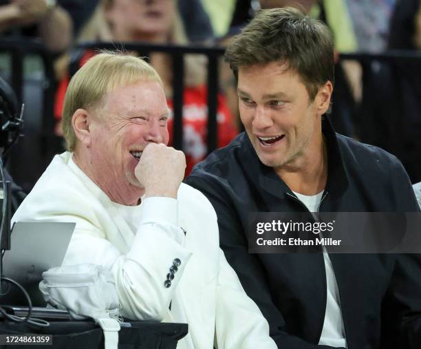 Las Vegas Raiders owner and managing general partner and Las Vegas Aces owner Mark Davis and Tom Brady laugh as they attend Game One of the 2023 WNBA...