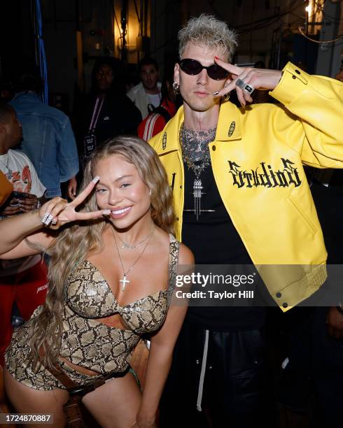 Latto and Machine Gun Kelly attend the Forbes 30 Under 30 Summit at Cleveland Public Auditorium on October 08, 2023 in Cleveland, Ohio.