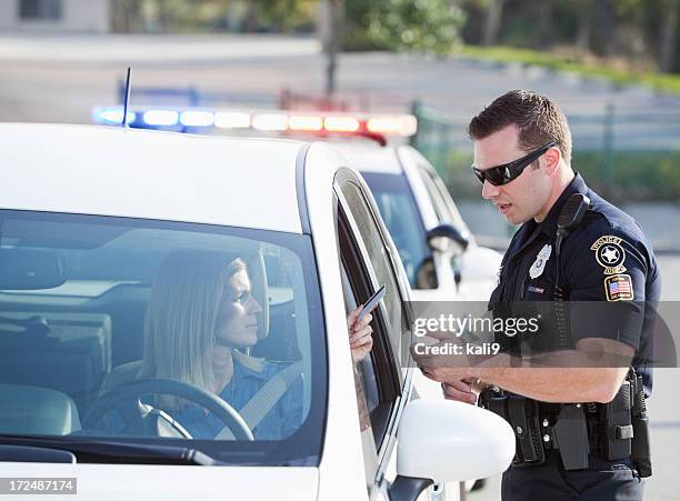 woman pulled over by police - pulled over by police stock pictures, royalty-free photos & images