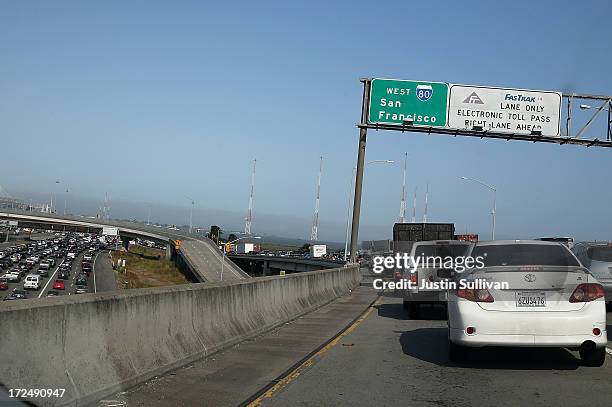 Commuter traffic backs up approaching the toll plaza to the San Francisco-Oakland Bay Bridge on July 2, 2013 in Oakland, California. For a second...