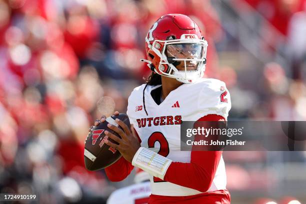 Gavin Wimsatt of the Rutgers Scarlet Knights drops back to pass during the game against the Wisconsin Badgers at Camp Randall Stadium on October 07,...