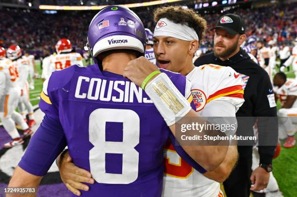 Kirk Cousins of the Minnesota Vikings and Patrick Mahomes of the Kansas City Chiefs hug after Kansas City's 27-20 win at U.S. Bank Stadium on October...