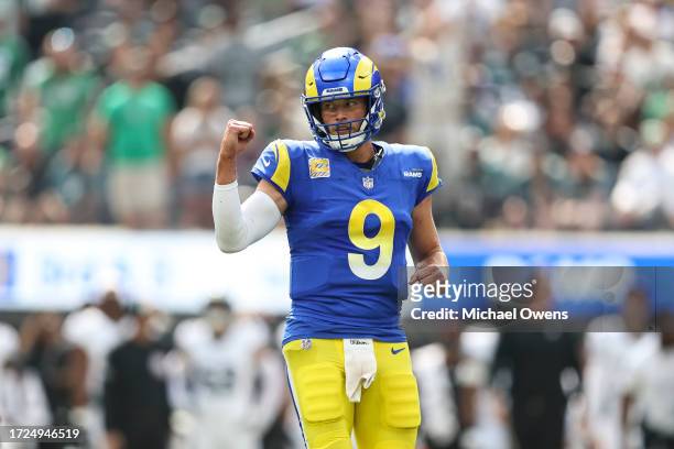 Matthew Stafford of the Los Angeles Rams celebrates after passing for a touchdown an NFL football game between the Los Angeles Rams and the...