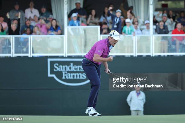 Luke List of the United States celebrates after after a putt on the first playoff hole of the final round of the Sanderson Farms Championship at The...
