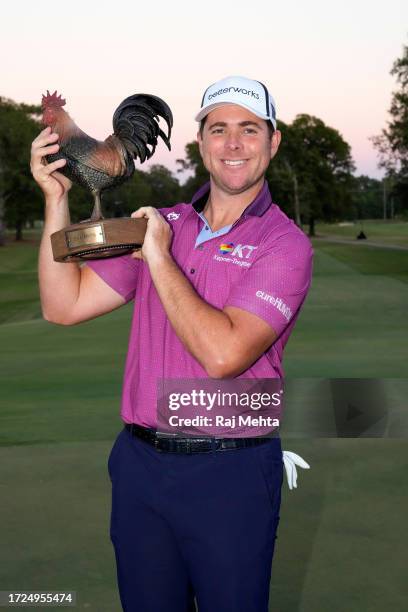 Luke List of the United States poses with the trophy after winning the Sanderson Farms Championship at The Country Club of Jackson on October 08,...