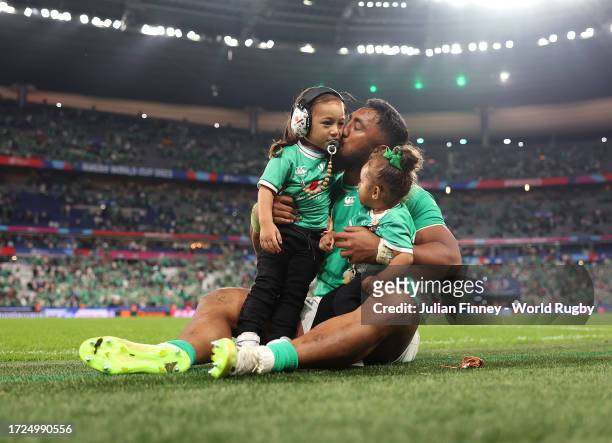 Bundee Aki of Ireland celebrates victory with his children after the Rugby World Cup France 2023 match between Ireland and Scotland at Stade de...