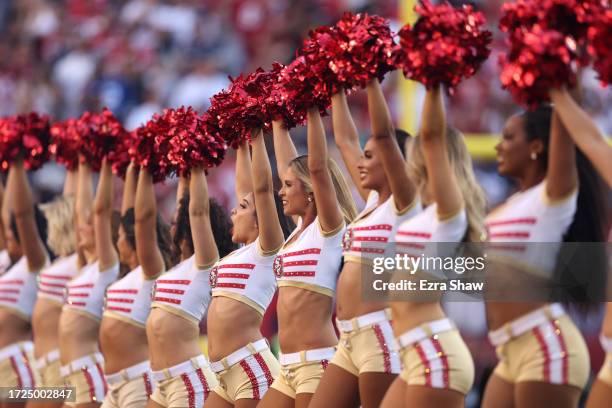 San Francisco 49ers cheerleaders perform on the field prior to a game against the Dallas Cowboys at Levi's Stadium on October 08, 2023 in Santa...