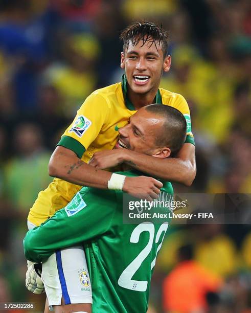 Neymar and Diego Cavalieri of Brazil celebrate victory after the FIFA Confederations Cup Brazil 2013 Final match between Brazil and Spain at Maracana...