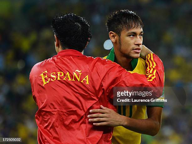 Neymar of Brazil and Xavi Hernandez of Spain embrace prior to the FIFA Confederations Cup Brazil 2013 Final match between Brazil and Spain at...