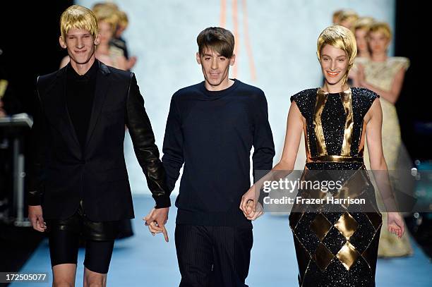 Designer Kilian Kerner and his models at the end of the Kilian Kerner Show during Mercedes-Benz Fashion Week Spring/Summer 2014 at Brandenburg Gate...