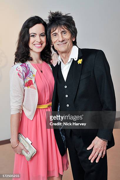 Ronnie Wood and Sally Wood attend the Masterpiece Midsummer Party in aid of Marie Curie at The Royal Hospital Chelsea on July 2, 2013 in London,...