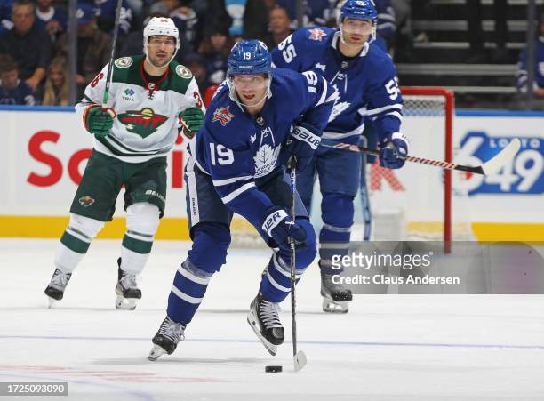 Calle Jarnkrok of the Toronto Maple Leafs skates with the puck against the Minnesota Wild during the second period in an NHL game at Scotiabank Arena...