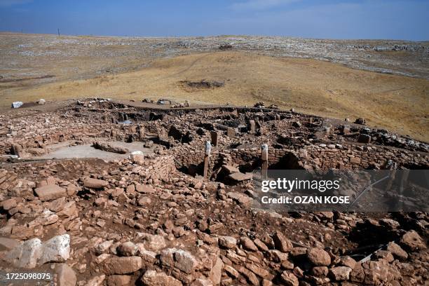 Photograph taken on October 9, 2023 shows a general view of the archaeological site of Karahantepe in Sanliurfa, southeastern Turkey. On this...