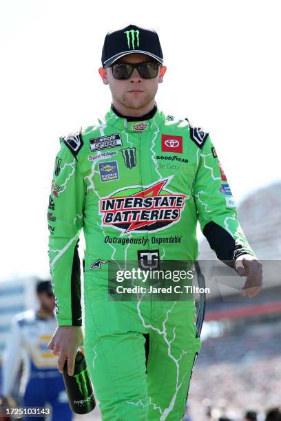 Ty Gibbs, driver of the Interstate Batteries All Battery Center Toyota, walks onstage during driver intros prior to the NASCAR Cup Series Bank of...