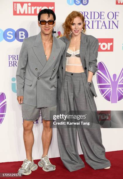 Carlos Gu and Angela Scanlon arrive at the Pride Of Britain Awards 2023 at Grosvenor House on October 08, 2023 in London, England.