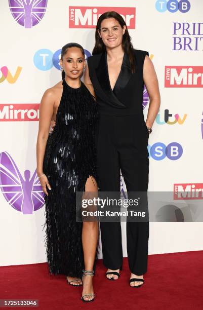 Amber Gill and Jen Beattie arrive at the Pride Of Britain Awards 2023 at Grosvenor House on October 08, 2023 in London, England.