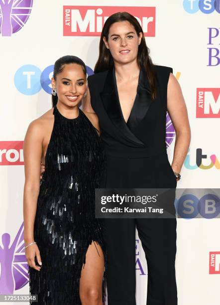 Amber Gill and Jen Beattie arrive at the Pride Of Britain Awards 2023 at Grosvenor House on October 08, 2023 in London, England.