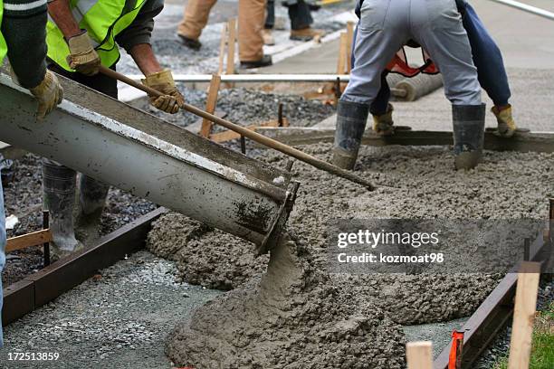 construction workers working on the sidewalk - sidewalk stock pictures, royalty-free photos & images