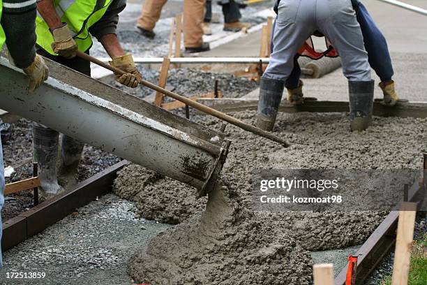 construction workers working on the sidewalk - concrete sidewalk stock pictures, royalty-free photos & images