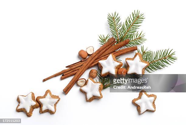 christmas pine with frosted sugar cookies and cinnamon - gingerbread cookie stock pictures, royalty-free photos & images