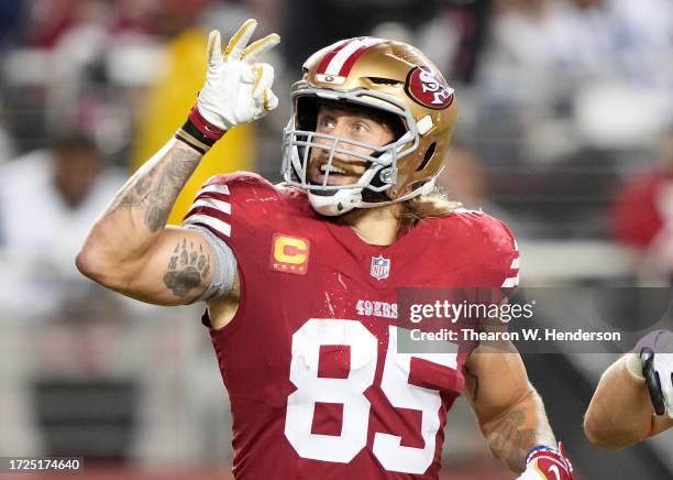 George Kittle of the San Francisco 49ers celebrates after a touchdown catch during the third quarter against the Dallas Cowboys at Levi's Stadium on...