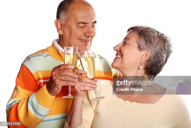 happy mature couple - well dressed couple isolated stock pictures, royalty-free photos & images