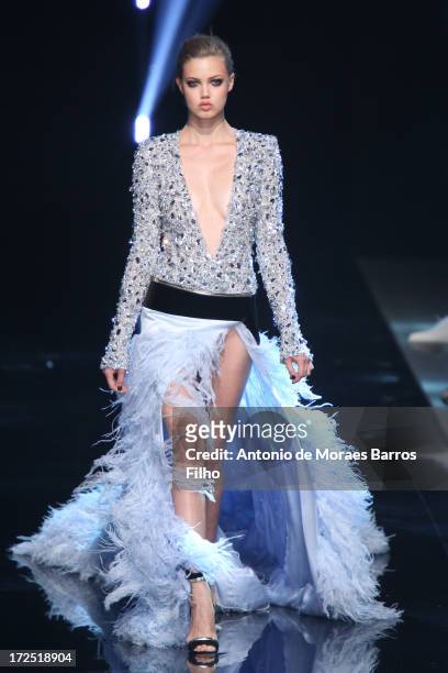 Model Lindsey Wixson walks the runway during the Alexandre Vauthier show as part of Paris Fashion Week Haute-Couture Fall/Winter 2013-2014 at Palais...