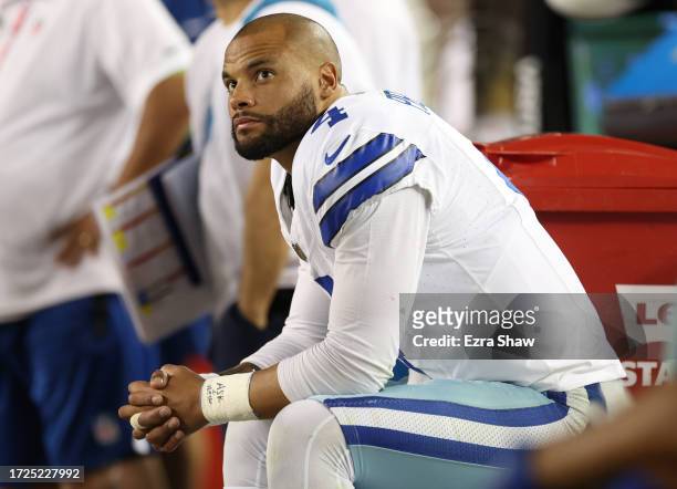 Dak Prescott of the Dallas Cowboys reacts on the bench during the fourth quarter against the San Francisco 49ers at Levi's Stadium on October 08,...