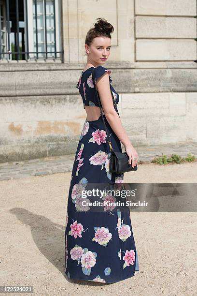 Fashion Student Elie McLean wears an Urban Outfitters dress, Cellini bag, Sports Girl shoes on day 1 of Paris Collections: Womens Haute Couture on...