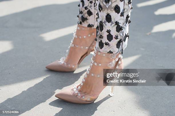 Model Elena Perminova wears Valentino shoes and a Giambattista Valli jumpsuit on day 1 of Paris Collections: Womens Haute Couture on July 01, 2013 in...