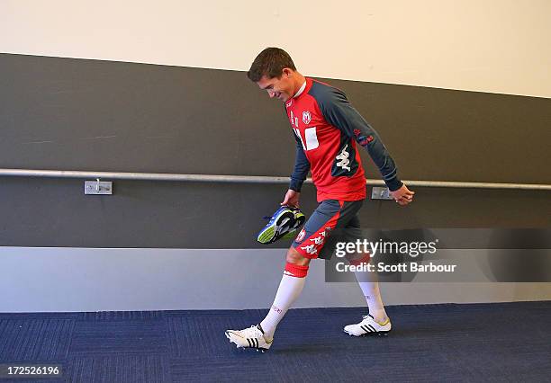 Harry Kewell of the Heart walks up the players tunnel as he arrives at a Melbourne Heart A-League training session at AAMI Park on July 3, 2013 in...