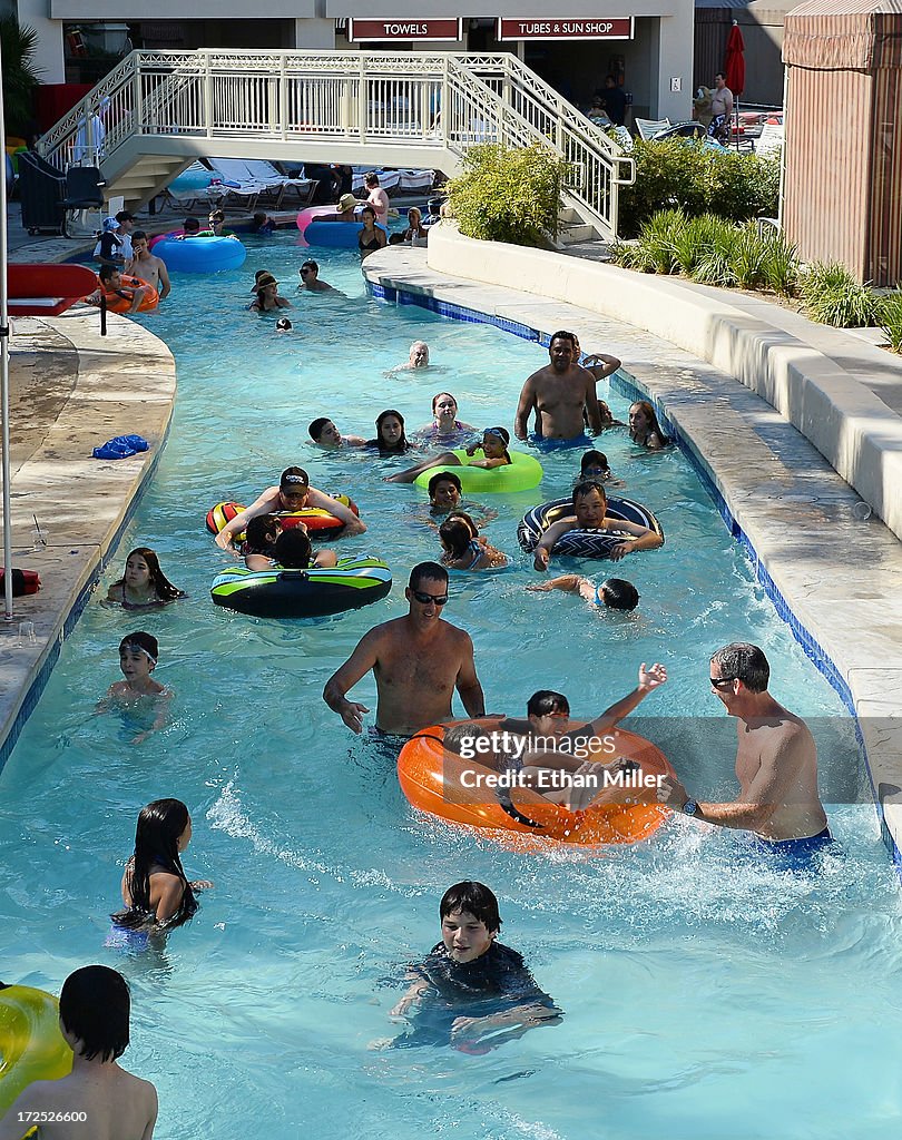 Guests play in the Lazy River at the Mandalay Bay Beach at the News  Photo - Getty Images
