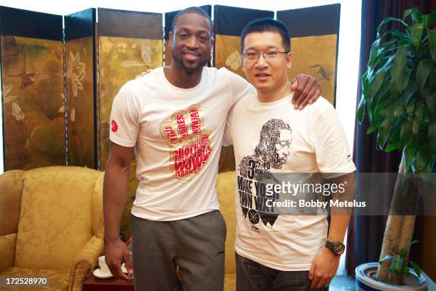 Dwyane Wade and Head of Li-Ning Basketball, Gavin Yang on July 2, 2013 in Beijing, China.