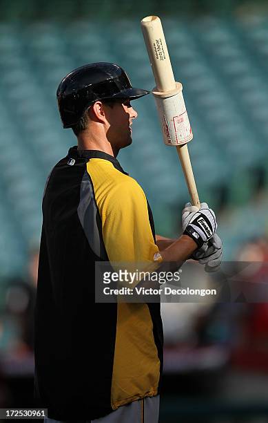 Jody Mercer of the Pittsburgh Pirates waits for his turn in the batting cage during batting practice prior to the MLB game against the Los Angeles...