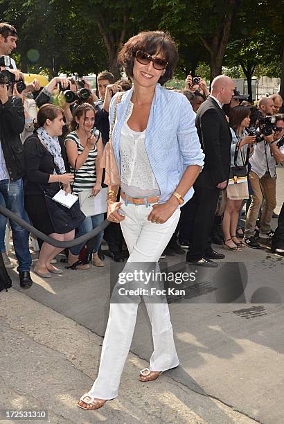 Ines De La Fressange attends the Chanel show as part of Paris Fashion Week Haute-Couture Fall/Winter 2013-2014 at the Grand Palais on July 2, 2013 in...