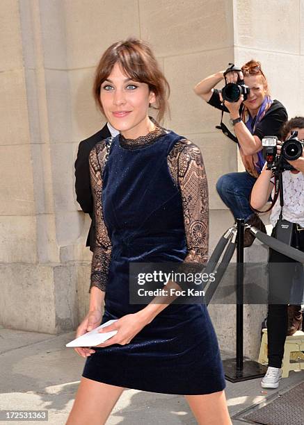 Alexa Chung attends the Chanel show as part of Paris Fashion Week Haute-Couture Fall/Winter 2013-2014 at the Grand Palais on July 2, 2013 in Paris,...