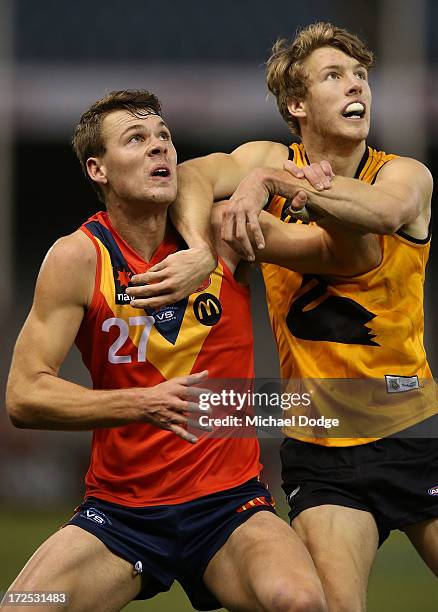 Matt Scharenberg of South Australia and Dylan Main of Western Australia contest for the ball during the AFL Under 18s Championship match between...