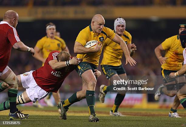 Stephen Moore of the Wallabies runs with the ball during game two of the International Test Series between the Australian Wallabies and the British &...