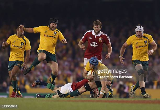 James Horwill of the Wallabies is tackled during game two of the International Test Series between the Australian Wallabies and the British & Irish...