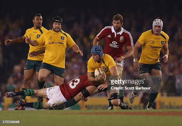 James Horwill of the Wallabies is tackled during game two of the International Test Series between the Australian Wallabies and the British & Irish...